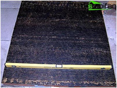 Imperméabilisation et vérification du niveau de fondation